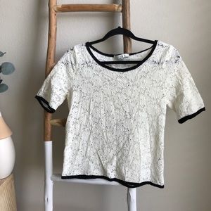 Forever 21 white lace top with black trim